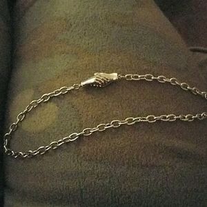 Unique magnetic hand necklace.